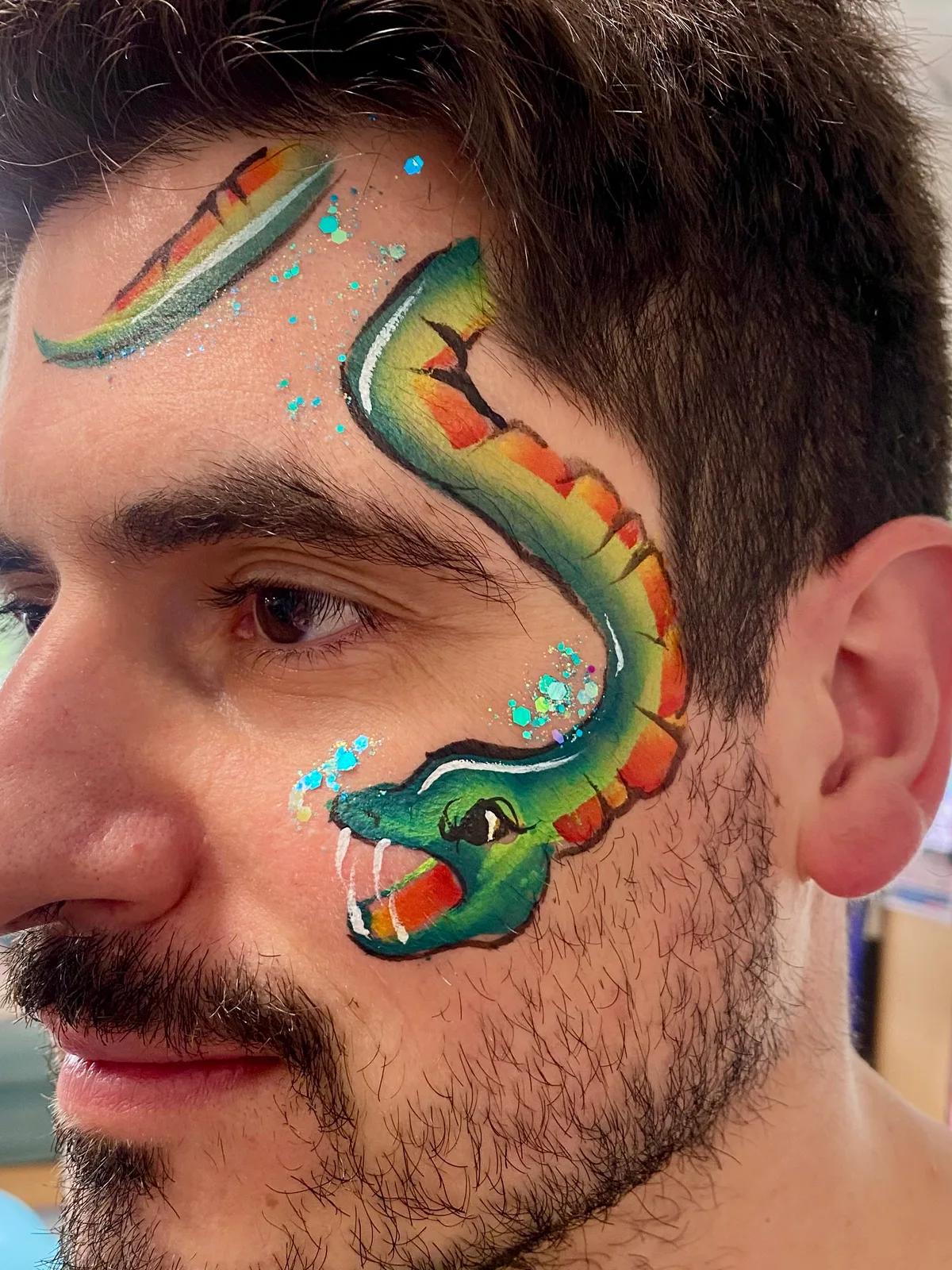 Snake face painting design variation
