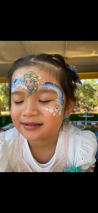 Elsa from Frozen face painting design