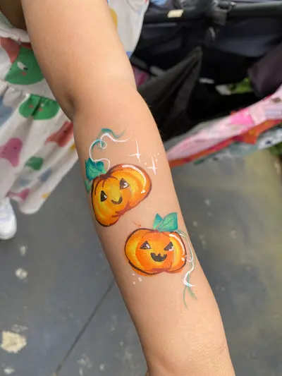Pumpkin face painting design